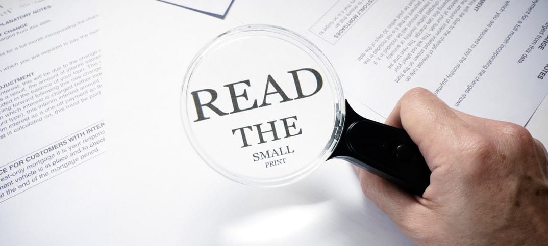 magnifying glass over small print