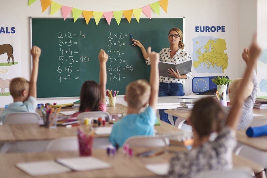 stock image in front of a blackboard